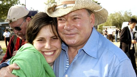 William Shatner and his daughter Melanie embracing outdoors