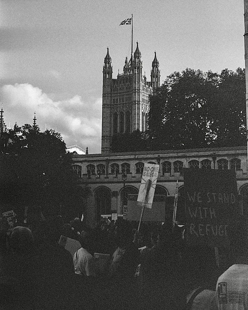 Black and white street scene near the Houses of Parliament, London