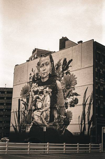 A building facade painted with a large mural