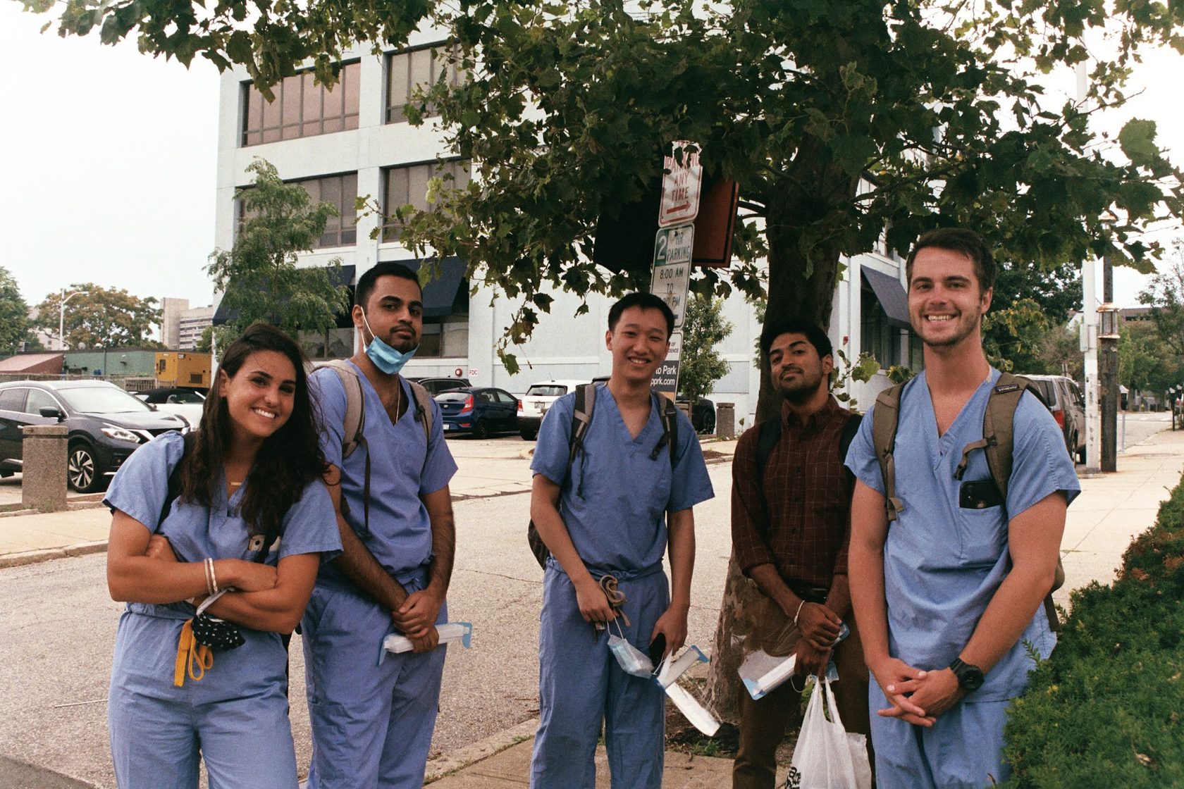 Group portrait of medical students in scrubs