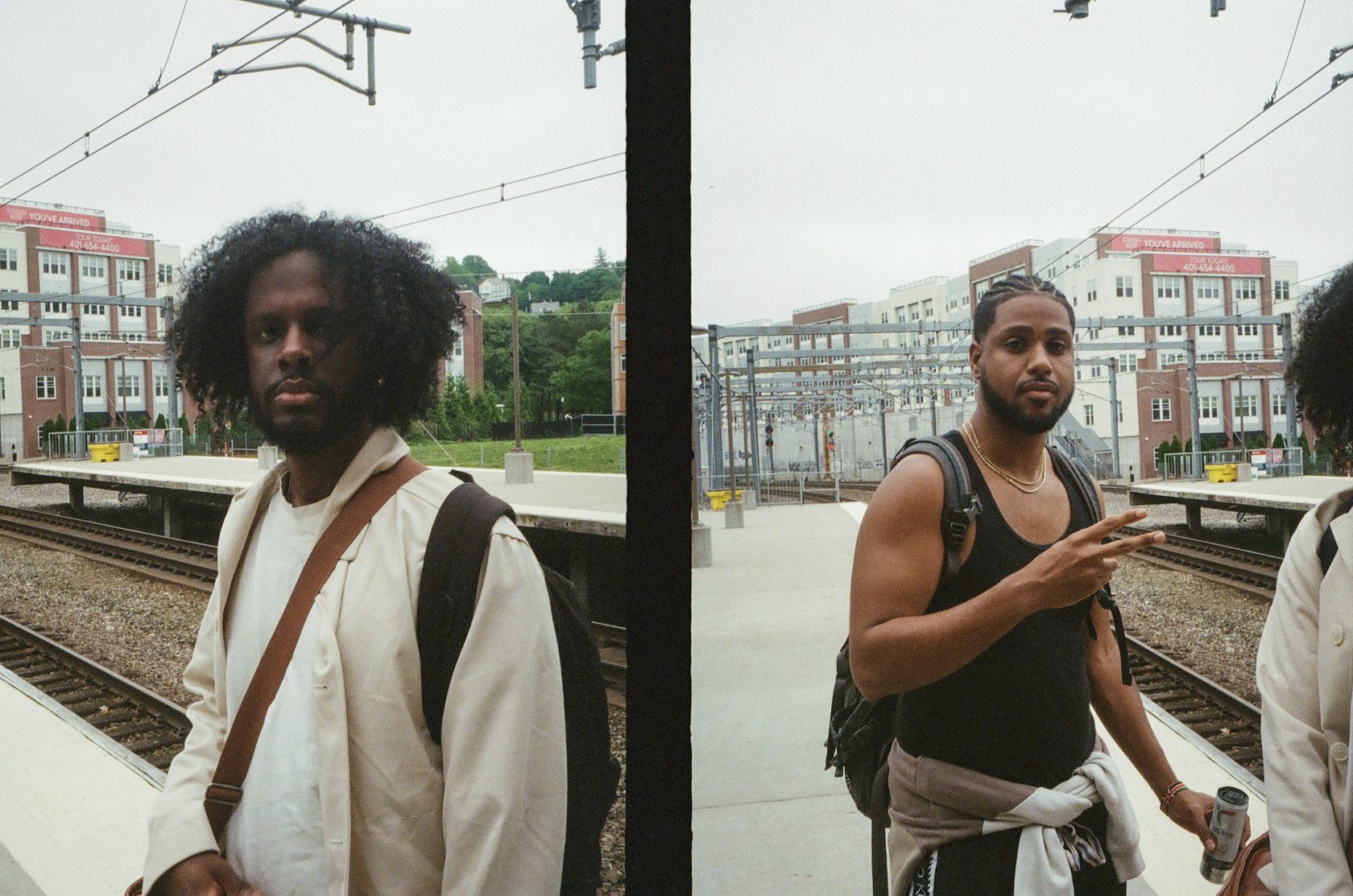 Two friends on a train platform